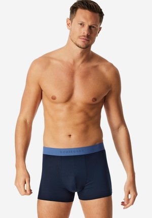 Donkerblauwe herenshort boxer met een blauwe tailleband en een grijs logo. Gemaakt van een gladde, rekbare stof voor comfort en pasvorm.