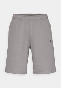 Pantalones cortos deportivos grises con una cintura elástica, textura suave y un pequeño logo en el lado izquierdo. Longitud estándar, sin bolsillos.