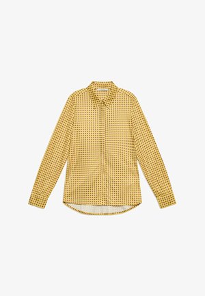 Langarmhemd aus leichtem Stoff, mit gelbem Hintergrund und gleichmäßig verteilten roten und schwarzen kreisförmigen Mustern, abgerundeter Saum.