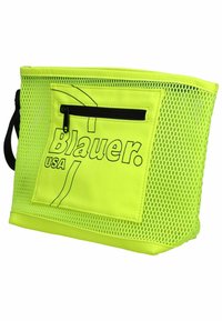 Síťová taška v jasně neonově žluté barvě s černými akcenty. Obsahuje zipovou kapsu a na boku je potisk "Blauer USA".