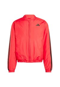Red jacket with a stand-up collar, full zipper, and elastic cuffs. Features black side stripes and logo on the chest. Lightweight, smooth texture.