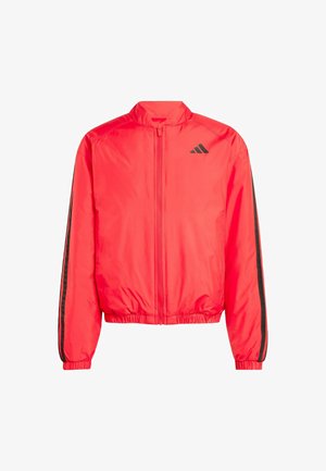 Red jacket with a stand-up collar, full zipper, and elastic cuffs. Features black side stripes and logo on the chest. Lightweight, smooth texture.