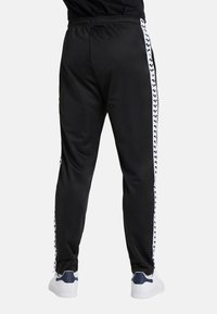 Arena RELAX IV TEAM - Pantalones deportivos - black white black