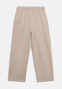 Μπεζ παντελόνια jogger κατασκευασμένα από μαλακό ύφασμα με μείγμα βαμβακιού, με ελαστική μέση και πλαϊνές τσέπες, με ίσια γραμμή στο πόδι.