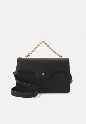 Black rectangular handbag with a gold twisted chain handle, front flap, small logo, and an additional long black shoulder strap.
