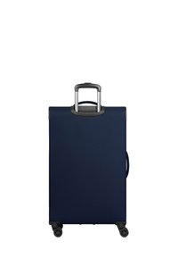 Valigia blu navy con superficie in tessuto texturizzato, manico retrattile e ruote doppie per la mobilità. Design rettangolare semplice senza motivi.