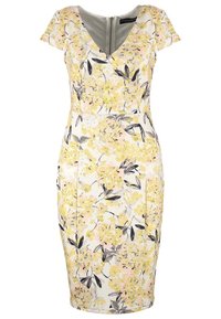 Robe ajustée longueur genou avec manches courtes, col en V, fermeture éclair au dos et motif floral jaune pâle sur fond blanc.