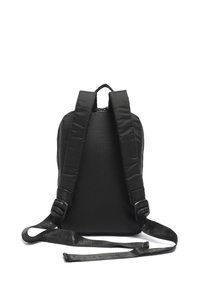 Black fabric backpack with textured surface, padded shoulder straps, and adjustable buckles. Features a top handle for carrying.