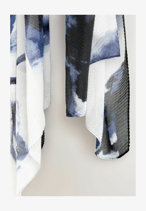 Kerge sall, millel on abstraktne disain sinises, mustas ja valges värvitoonis. Valmistatud pehmest kangast tekstuurse äärega ja voolava langevusega.