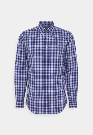 Knopfhemd mit langen Ärmeln, einem karierten Muster in Lila, Blau und Weiß sowie einem Kragen mit Knöpfen.