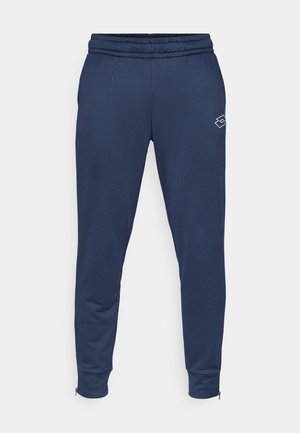 Marineblaue Jogginghosen aus weichem Stoff mit elastischem Bund, schmal zulaufenden Beinen und Reißverschlüssen an den Knöcheln. Mit einem Logo auf der Vorderseite.