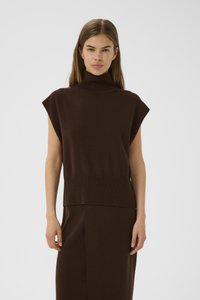 Brown knitted sleeveless top with a high collar, featuring a relaxed fit and ribbed hem, paired with a matching brown skirt.