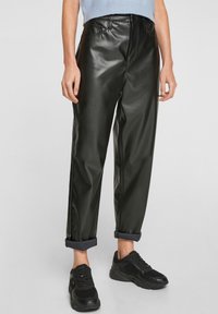 QS Spodnie skórzane