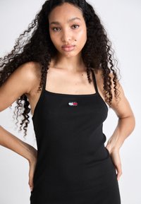 Tommy Jeans STRAPPY BADGE DRESS - Jersey dress - black