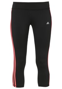 Czarne legginsy sportowe o dopasowanym kroju, z różowymi paskami po bokach i wyhaftowanym logo na górnej części uda. Gładka struktura materiału.