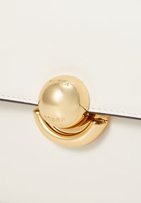Furla SFERA mleczny