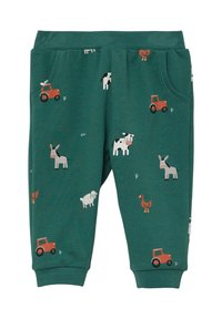 Groene katoenen sweatpants met een verscheidenheid aan afdrukken van boerderij dieren en illustraties van een oranje tractor, met zijzakken en geribbelde boorden.