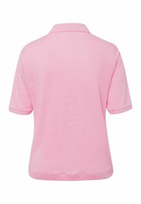 Růžová polo košile s krátkým rukávem, která se vyznačuje jemnou texturou, klasickým límečkem a decentními lemy. Lehčí materiál pro pohodlí.