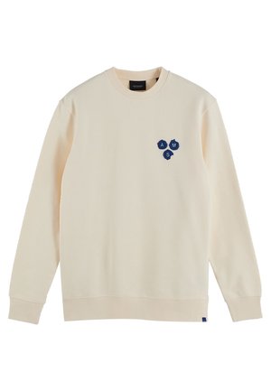Cream-colored long-sleeve sweatshirt with crew neckline and small navy blue emblem of three connected hexagons displaying letters A, M, S on chest.