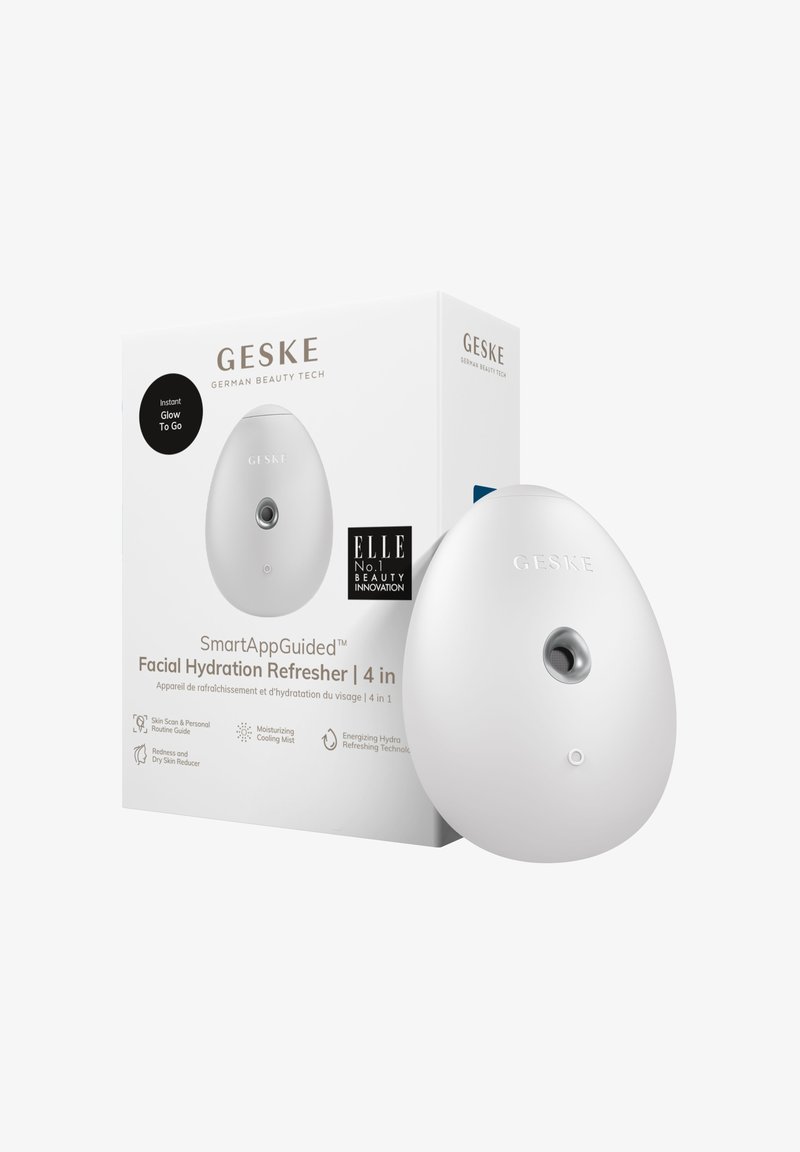 White, oval facial hydration refresher with a silver nozzle. Includes a box with branding, usage instructions, and icons for features.