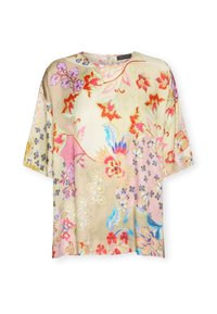 Blusa suelta de manga corta con fondo beige que presenta patrones florales en rojo, rosa, azul y púrpura y un escote redondo.