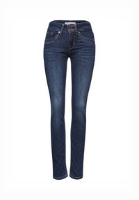 Jeans de mezclilla azul oscuro con un corte ajustado, que cuentan con una cintura de altura media, diseño de cinco bolsillos y costuras en contraste. Textura suave en todo su superficie.