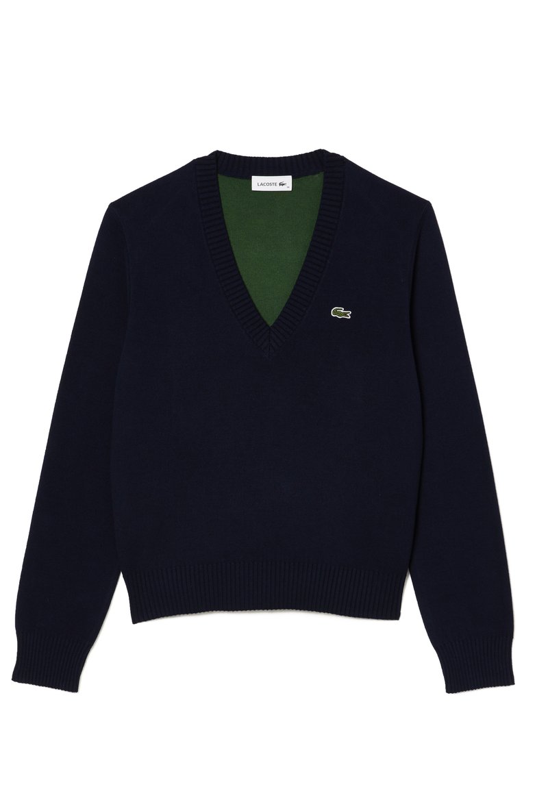 Maglione a V navy in morbido tessuto, con colletto e polsini a coste, interno verde a contrasto e piccolo logo sul petto.