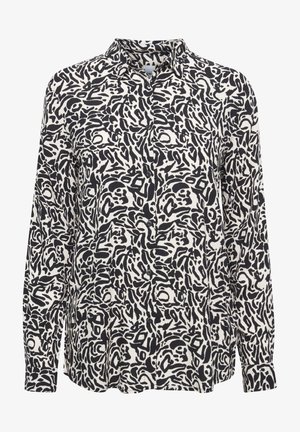 Camicetta a maniche lunghe con un design astratto in bianco e nero, dotata di colletto e chiusura frontale con bottoni. Tessuto leggero.