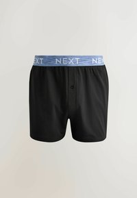 Boxers pour hommes noirs avec braguette à boutons et ceinture élastique bleue imprimée avec des logos "NEXT" blancs répétés.