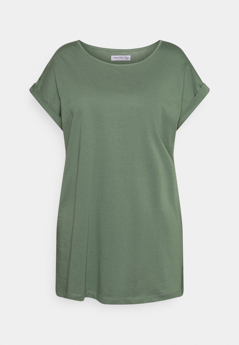 Loose-fitting short-sleeve olive green T-shirt with rolled cuffs and a round neckline on a white background.