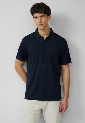 - Koszulka polo