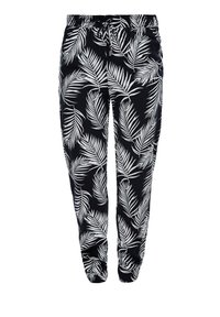 Svarta byxor med ett vitt lövtryck, med elastisk midja och dragsko, åtsittande passform och mjuk tygtextur.