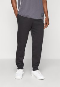 Champion ICONS CUFF PANTS - Jogginghose - black