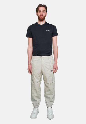 Armani Exchange Pantaloni - bia  latte