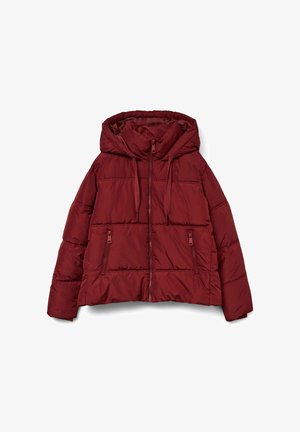 Bordeauxrød dunjakke lavet af vatteret stof med hætte, frontlynlås og to sidelommer med lynlåse. Blød tekstur, afslappet pasform.