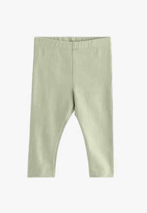 Vihreät puuvillalegginsit, joissa on pehmeä tuntuma, joustava vyötärönauha ja ei näkyviä saumoja. Niissä on kapea muotoilu ja nilkkapituus.