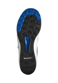 Podeszwa buta ma czarną gumową podstawę z głębokimi bieżnikami, niebieskimi akcentami i charakterystycznym wzorem. Zawiera wyraźnie widoczne logo Michelin.