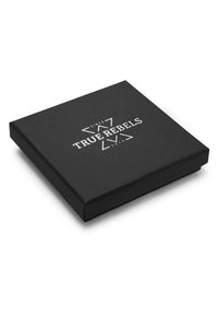 Black square box with a smooth matte finish. Features the text "TRUE REBELS" in white at the center, with decorative accents.