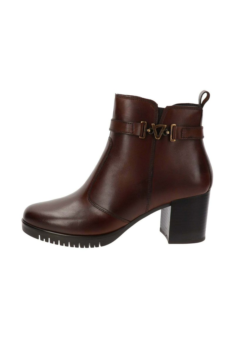 Bottines en cuir marron avec une pointe arrondie, un talon carré et une sangle décorative avec un accent métallique. Semelle texturée pour une meilleure adhérence.