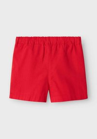 Pantaloni corti rossi di cotone con vita elastica. Design semplice senza tasche, con orlo pulito e texture liscia.
