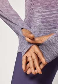 ASICS SEAMLESS LS TOP - Maglietta a manica lunga - coral reef/greyish purple