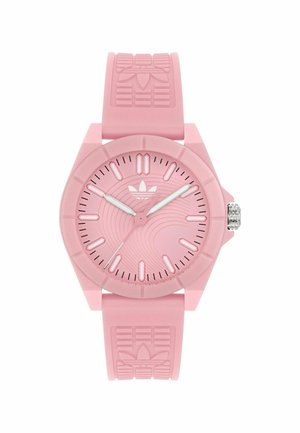 Rosa Silikon-Uhr mit rundem Zifferblatt, strukturiertem Armband und silbernen Zeigern. Das Zifferblatt zeigt ein Wellenmuster, und das Adidas-Logo befindet sich auf dem Armband.