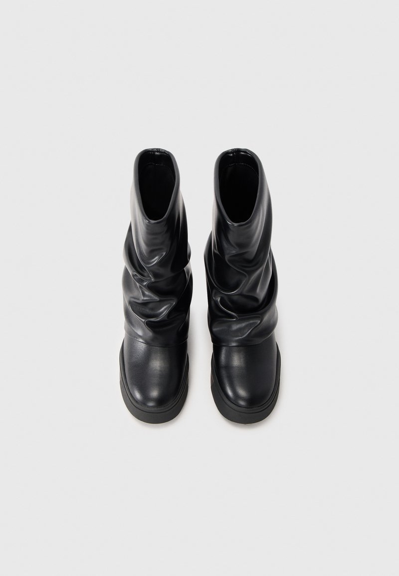 Bottines Compensées Keen En Cuir Noir – Taille 35 EU (US 5) – Fermeture Zippée – Occasion