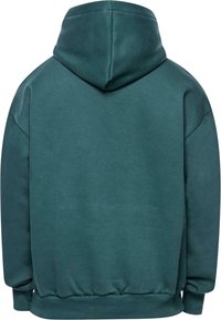 Kapuzensweatshirt in dunklem Teal, aus weichem Stoff gefertigt. Bietet eine entspannte Passform, ribbelige Bündchen und Saum sowie eine glatte Textur.