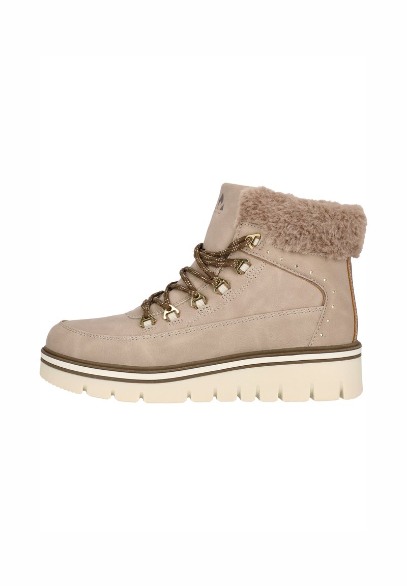 Bottine beige à lacets avec col en fausse fourrure, tige en suède texturé, semelle blanche rembourrée et œillets en métal décoratifs.