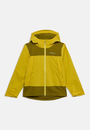 Rumena in olivno zelena jakna s kapuco, z zadrgo spredaj, dvobarvnim dizajnom in logotipom na prsih. Izdelana iz lahkega, vodoodpornega materiala.