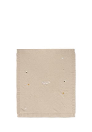 Couverture en tricot beige avec des bords côtelés, ornée d'abeilles brodées, d'une feuille et d'étoiles, avec le mot "nanán" en police blanche courbée.