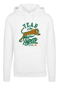 Weißer Kapuzenpullover mit einem bunten Tiger-Graphik, dem Schriftzug "JAHR des Tigers" und "HAWKINS HIGH SCHOOL '86" in Orange und Grün.