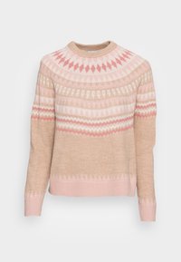 Ljusbeige tröja med rund hals, prydd med intrikata rosa och vita mönster över bröstet och ärmarna, samt ribbade muddar och nederkant.