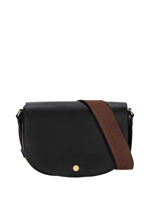 Black leather crossbody bag with curved flap and round gold button, featuring a wide brown fabric shoulder strap.